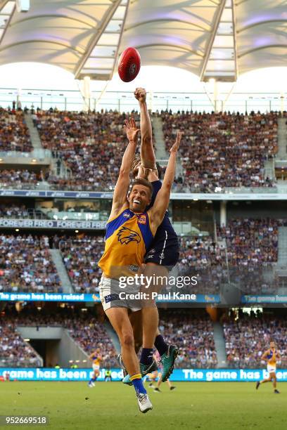 Mark LeCras of the Eagles and Connor Blakely of the Dockers contest a mark during the Round 6 AFL match between the Fremantle Dockers and West Coast...