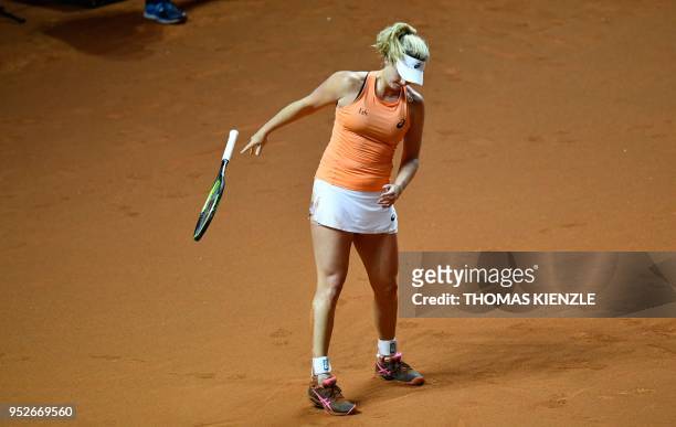 CoCo Vandeweghe from the US smashes her racket as she plays against Karolina Pliskova from the Czech Republic during their final match at the WTA...