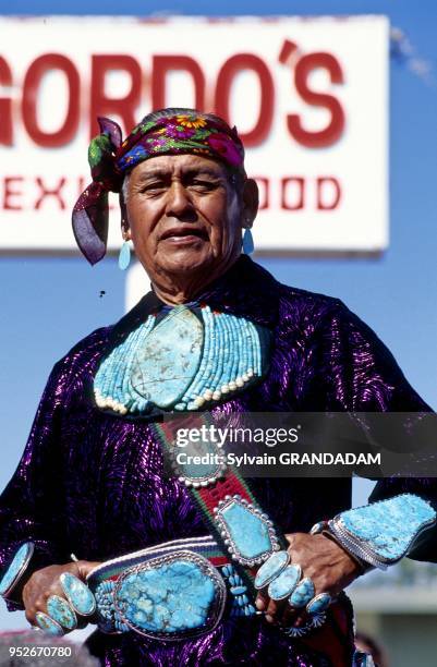 Zuni medicine man weariu g all his turquoise jewels attending the yearly indian ceremonial in Gallup. New Mexico. SouthWest. United States.