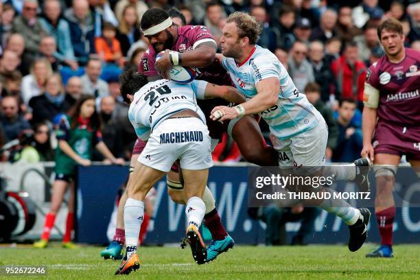 Bordeaux-Begles's Apisai Naqalevu is tackled during the French Top 14 rugby union match Bordeaux-Begles vs Racing 92 at the Stade Chaban-Delmas in...