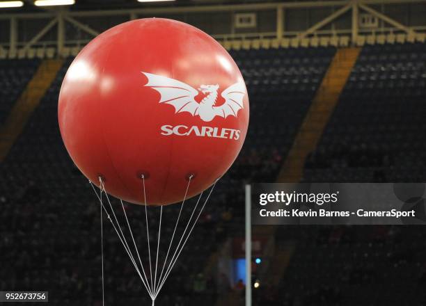 Scarlets balloon flies in the stadium during the Guinness PRO14 Round 21 Judgement Day VI match between Cardiff Blues and Ospreys at Principality...