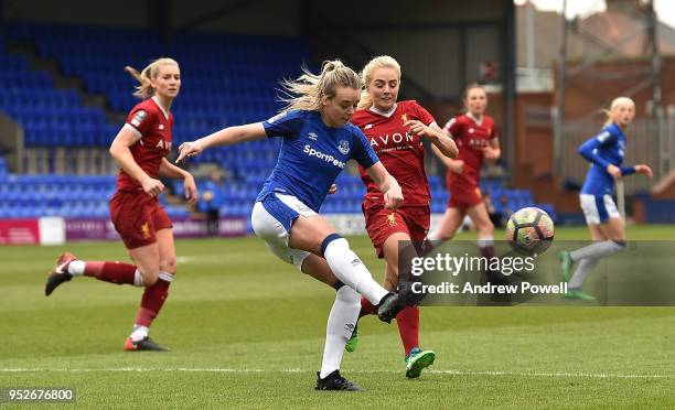 Mollie Green Everton Ladies clears the ball away from Alex Greenwood of Liverpool Ladies during the WSL match between Liverpool Ladies and Everton...