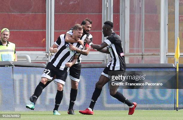 Seko Fofana, Danilo and Silvan Widmer of Udinese Calcio celebrate the 0-1 goal scored by Silvan Widmer during the serie A match between Benevento...