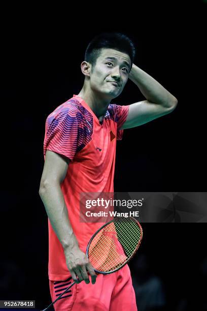 Chen long of China reacts during man's singles final match against Kento Momota of Japan at the 2018 Badminton Asia Championships on Apirl 29, 2018...