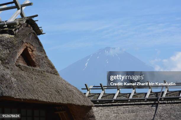 mt fuji and traditional houses - kamal zharif stock pictures, royalty-free photos & images