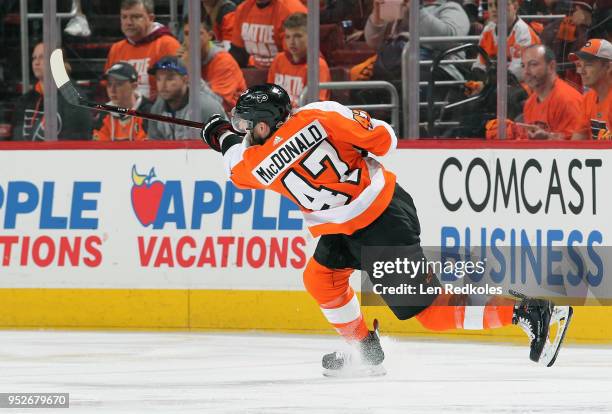 Andrew MacDonald of the Philadelphia Flyers takes a slapshot against the Pittsburgh Penguins in Game Six of the Eastern Conference First Round during...