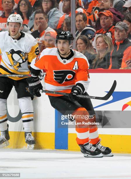 Valtteri Filppula of the Philadelphia Flyers skates against Jake Guentzel of the Pittsburgh Penguins in Game Six of the Eastern Conference First...