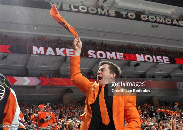 Fan of the Philadelphia Flyers celebrates during Game Six of the Eastern Conference First Round during the 2018 NHL Stanley Cup Playoffs against the...