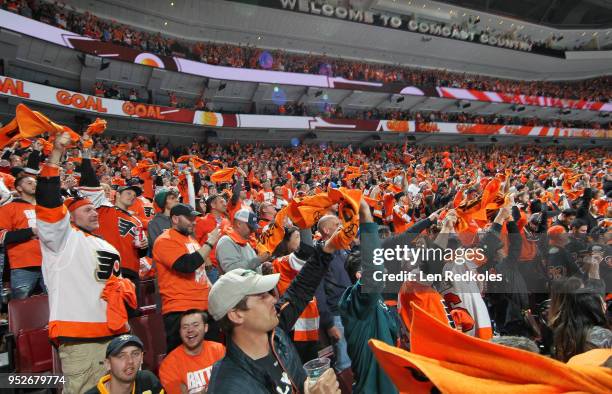 Fans of the Philadelphia Flyers celebrate a second period goal against the Pittsburgh Penguins in Game Six of the Eastern Conference First Round...