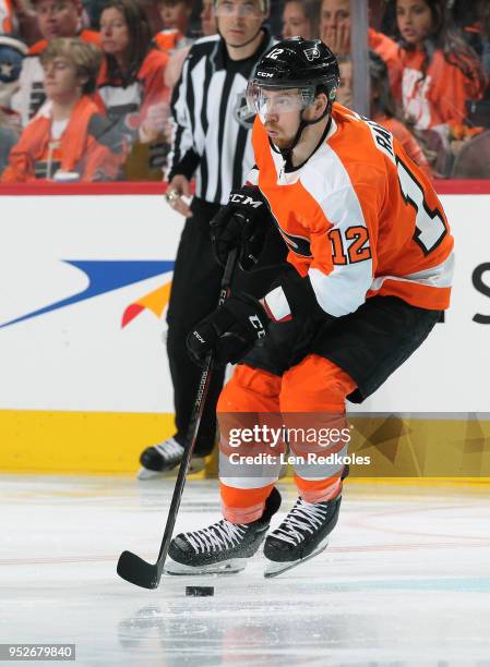 Michael Raffl of the Philadelphia Flyers skates the puck against the Pittsburgh Penguins in Game Six of the Eastern Conference First Round during the...