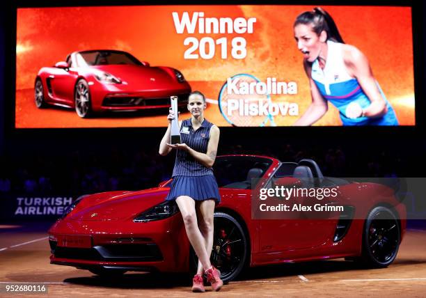 Karolina Pliskova of Czech Republic poses with the trophy after the singles final between Karolina Pliskova of Czech Republic and Coco Vandewghe of...