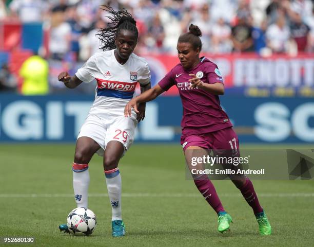 Griedge M'Bock Bathy of Olympique Lyonnais is challenged by Nikita Parris of Manchester City Women during the UEFA Women's Champions League, Semi...