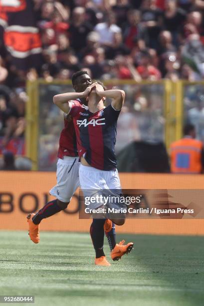 Riccardo Orsolini of Bologna FC celebrates after scoring his team's first goal during the serie A match between Bologna FC and AC Milan at Stadio...