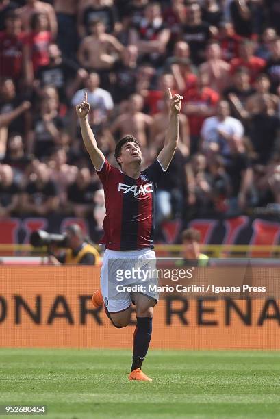 Riccardo Orsolini of Bologna FC celebrates after scoring his team's first goal during the serie A match between Bologna FC and AC Milan at Stadio...