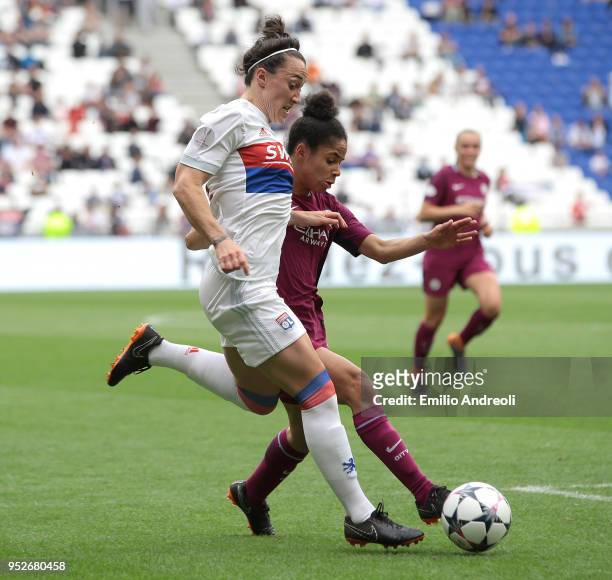 Lucy Bronze of Olympique Lyonnais is challenged by Nikita Parris of Manchester City Women during the UEFA Women's Champions League, Semi Final Second...