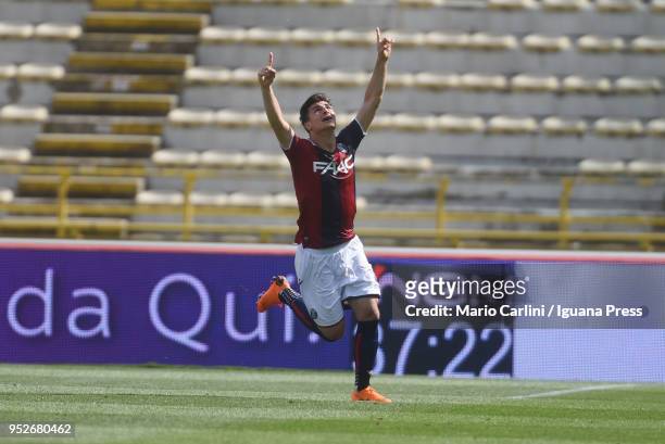 Riccardo Orsolini of Bologna FC celebrates after scoring his team's first goal during the serie A match between Bologna FC and AC Milan at Stadio...