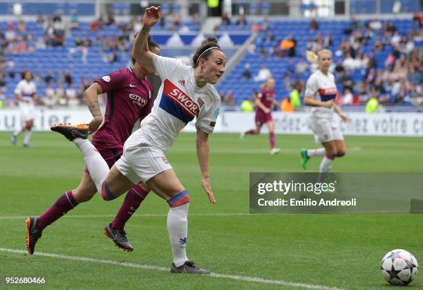 Lucy Bronze of Olympique Lyonnais is challenged by Nikita Parris of Manchester City Women during the UEFA Women's Champions League, Semi Final Second...