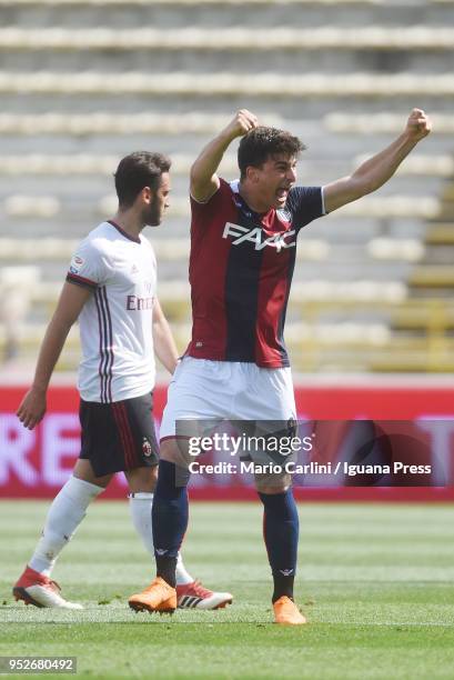 Riccardo Orsolini of Bologna FC celebrates after scoring his team's first goal during the serie A match between Bologna FC and AC Milan at Stadio...