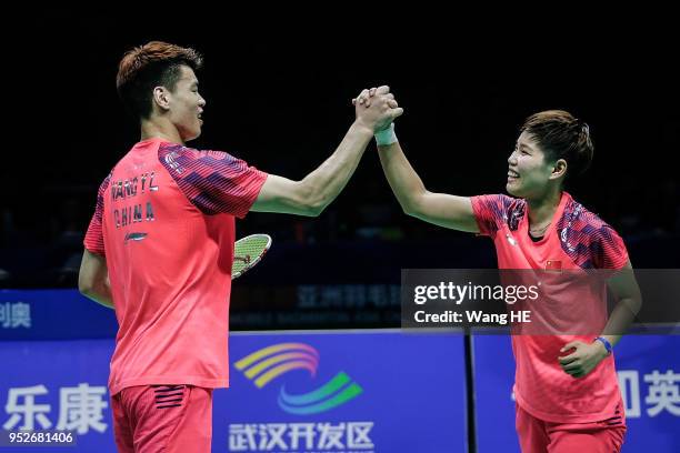 Wang Yulyu and Huang Dongping of China Celebrate wins the game after mixed doubles final match against Tontowi Ahmad and Liliyana Natsir of Indonesia...