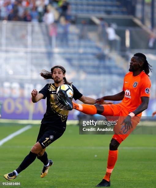 Emmanuel Adebayor of Medipol Basaksehir in action against Miguel Pinto of Osmanlispor during the Turkish Spor Toto Super Lig soccer match between...