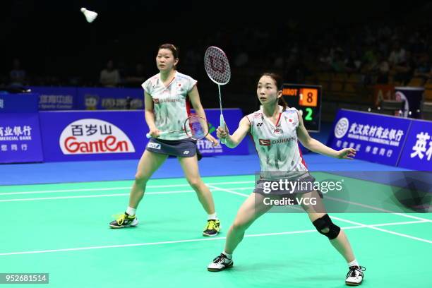 Misaki Matsutomo of Japan and Ayaka Takahashi of Japan compete against Yuki Fukushima of Japan and Sayaka Hirota of Japan during women's doubles...