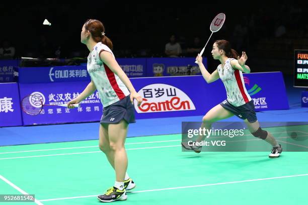 Misaki Matsutomo of Japan and Ayaka Takahashi of Japan compete against Yuki Fukushima of Japan and Sayaka Hirota of Japan during women's doubles...