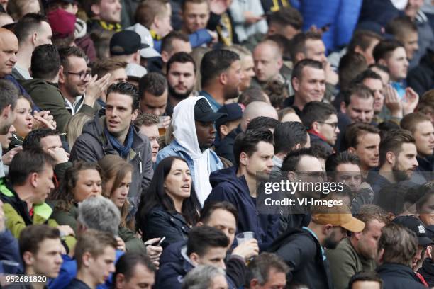 Thierry Ambrose of NAC Breda betweens the fans of NAC Breda at the stand during the Dutch Eredivisie match between NAC Breda and sc Heerenveen at the...