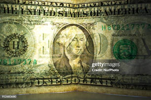 Dollar and British Pound bank notes and are photographed in London on April 29, 2018. The U.S. Benchmark government bond yield broke through the...