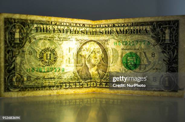 Dollar and British Pound bank notes and are photographed in London on April 29, 2018. The U.S. Benchmark government bond yield broke through the...