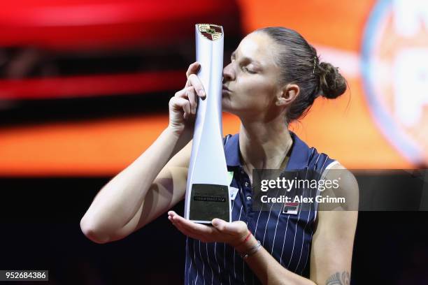 Karolina Pliskova of Czech Republic celebrates with the trophy after winning the singles final match against CoCo Vandeweghe of the United States on...