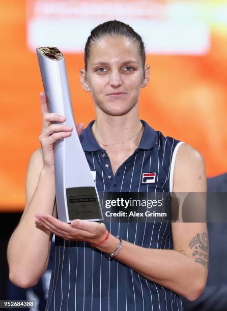 STUTTGART, GERMANY Karolina Pliskova of Czech Republic celebrates with the trophy after winning the singles final match against CoCo Vandeweghe of...