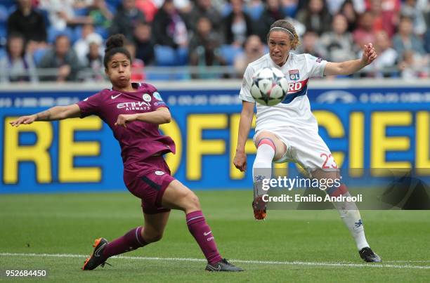 Camille Abily of Olympique Lyonnais is challenged by Demi Stokes of Manchester City Women during the UEFA Women's Champions League, Semi Final Second...