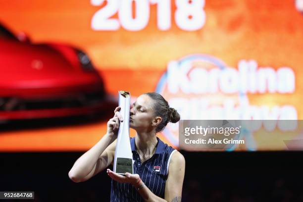 Karolina Pliskova of Czech Republic celebrates with the trophy after winning the singles final match against CoCo Vandeweghe of the United States on...