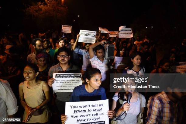 Members of Jawaharlal Nehru University Students Union march against the screening of film In the Name of Love-Melancholy of Gods Own Country, in JNU,...