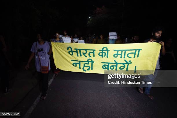 Members of Jawaharlal Nehru University Students Union march against the screening of film In the Name of Love-Melancholy of Gods Own Country, in JNU,...