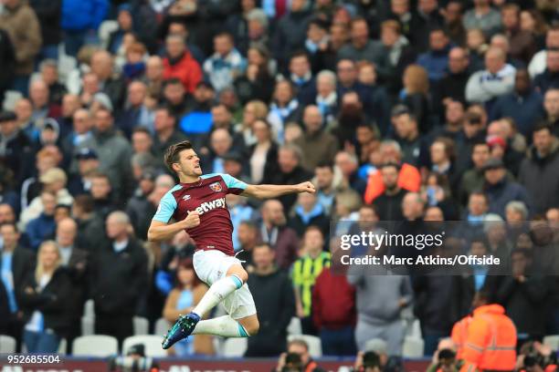 Aaron Cresswell of West Ham celebrates scoring their 1st goal during the Premier League match between West Ham United and Manchester City at London...