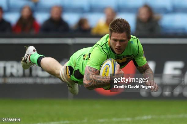 Teimana Harrison of Northampton Saints touches down for the first try during the Aviva Premiership match between Wasps and Northampton Saints at The...