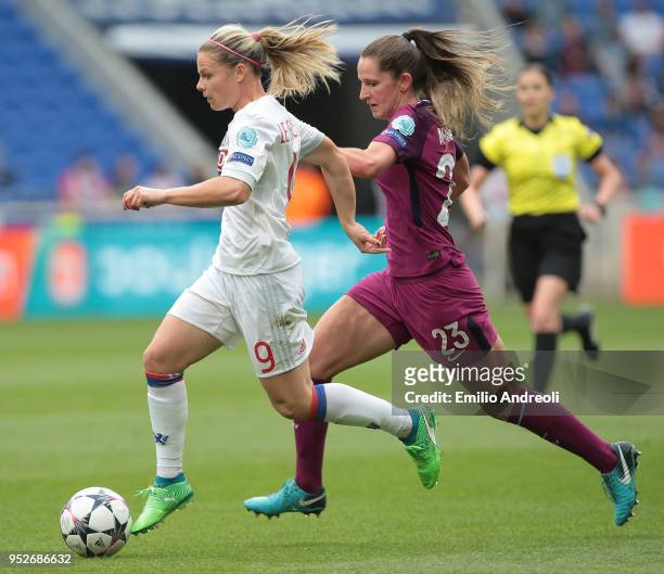 Eugenie Le Sommer of Olympique Lyonnais is challenged by Abbie McManus of Manchester City Women during the UEFA Women's Champions League, Semi Final...