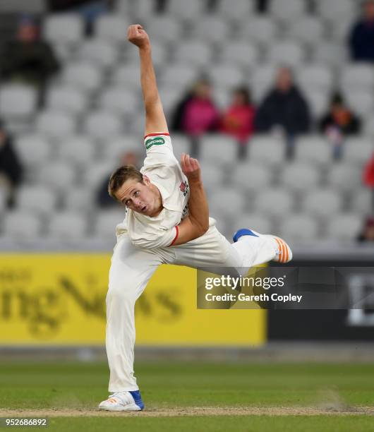 Joe Mennie of Lancashire bowls during the Specsavers County Championship Division One Ãmatch between Lancashire and Surrey at Old Trafford at Old...