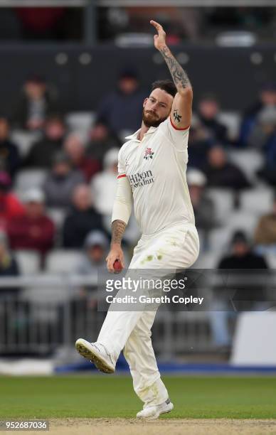 Jordan Clark of Lancashire bowls during the Specsavers County Championship Division One Ãmatch between Lancashire and Surrey at Old Trafford at Old...