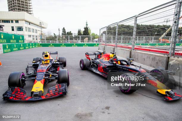 Max Verstappen of Red Bull Racing and The Netherlands and Daniel Ricciardo of Australia and Red Bull Racing car's after their crash during the...