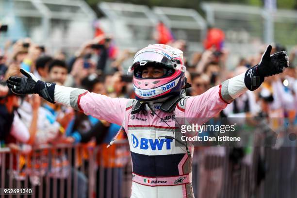 Third place finisher Sergio Perez of Mexico and Force India celebrates in parc ferme during the Azerbaijan Formula One Grand Prix at Baku City...