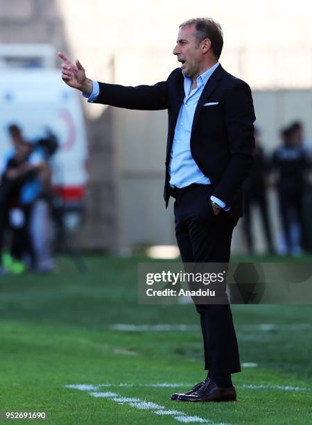 Head coach Abdullah Avci of Medipol Basaksehir gives tactics to his team during the Turkish Spor Toto Super Lig soccer match between Osmanlispor and...