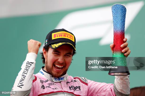 Third place finisher Sergio Perez of Mexico and Force India celebrates on the podium during the Azerbaijan Formula One Grand Prix at Baku City...