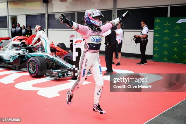 Third place finisher Sergio Perez of Mexico and Force India celebrates in parc ferme during the Azerbaijan Formula One Grand Prix at Baku City...