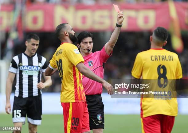 Referee Fabio Maresca shows the red card to Danilo Cataldi during the serie A match between Benevento Calcio and Udinese Calcio at Stadio Ciro...