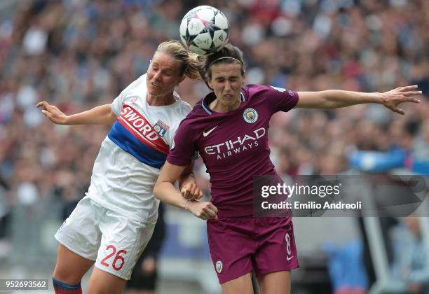 Amandine Henry of Olympique Lyonnais jumps for the ball against Jill Scott of Manchester City Women during the UEFA Women's Champions League, Semi...