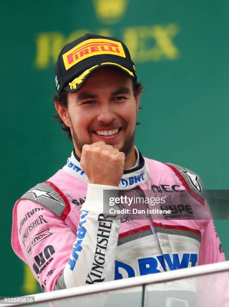 Third place finisher Sergio Perez of Mexico and Force India celebrates on the podium during the Azerbaijan Formula One Grand Prix at Baku City...