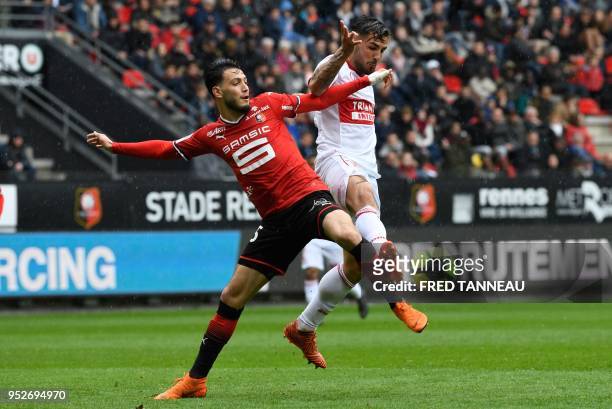 Rennes' Algerian defender Ramy Bensebaini vies with Toulouse's French forward Andy Delort during the French L1 football match Rennes vs Toulouse on...
