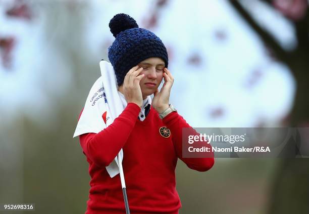 Elena Moosmann reacts on the 2nd green during the final round of the Girls' U16 Open Championship at Fulford Golf Club on April 29, 2018 in York,...